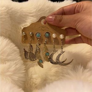 Dangle and stubs fashion earrings with some turquoise to give it a splashy vibe